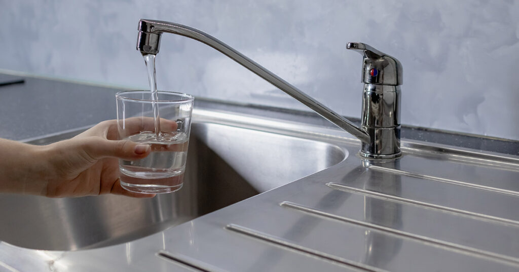 There May Be a Hidden Cancer Risk In Your Tap Water - Featured image
