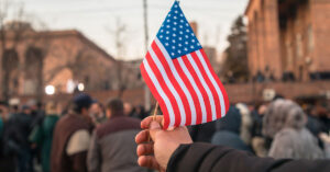 person holding American flag
