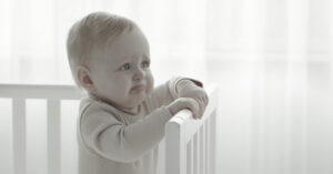 What Became of the Infant Involved in One of the Most Unethical Psychological Studies? infant in standing in their crib