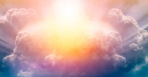sun piercing through clouds in heaven like depiction
