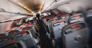 Ex-Pilot Reveals Why Plane Crashes Seem to be Increasing Inside a passenger jet. Plane seats and aisle