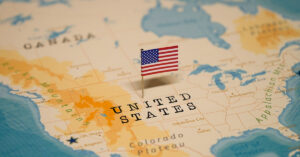 America Hits Record Low on World’s Happiest Countries List United States on a map marked with a small american flag