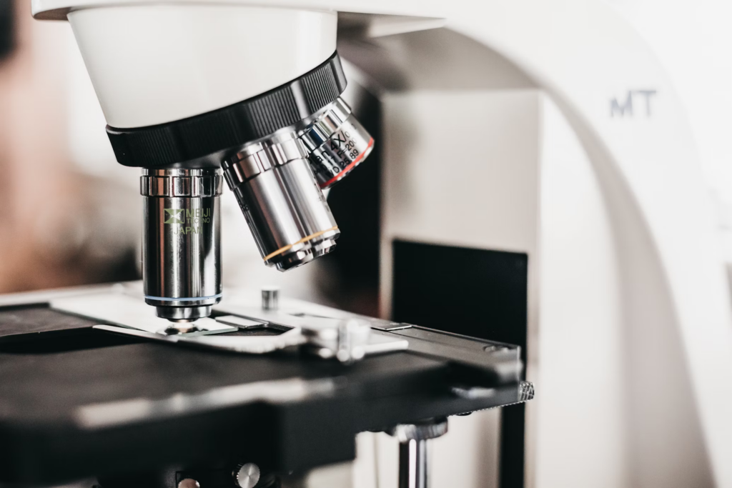 A microscope in a laboratory setting, highlighting research on a new sexually transmitted infection (STI).