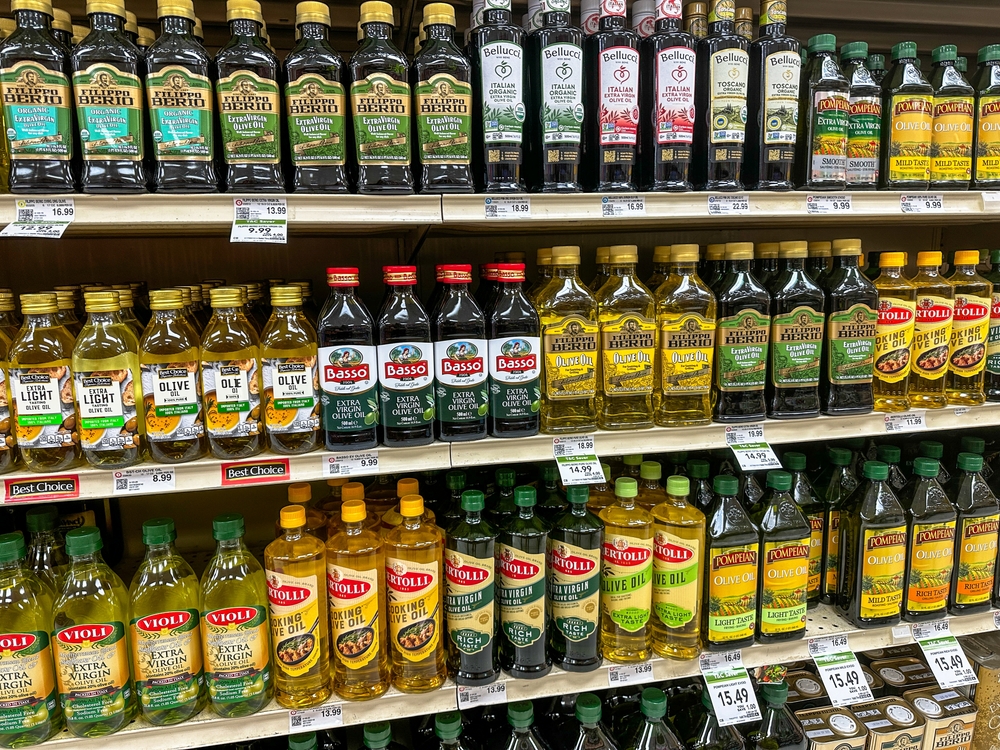 Valparaiso, IN USA - July 24, 2024 - A variety of olive oils on an American store shelf