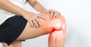 man grabbing knee joint. Knee pain