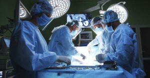 Woman’s Head ‘Reattached’ After Internal Decapitation Caused By Freak Gym Accident surgeons working on patient