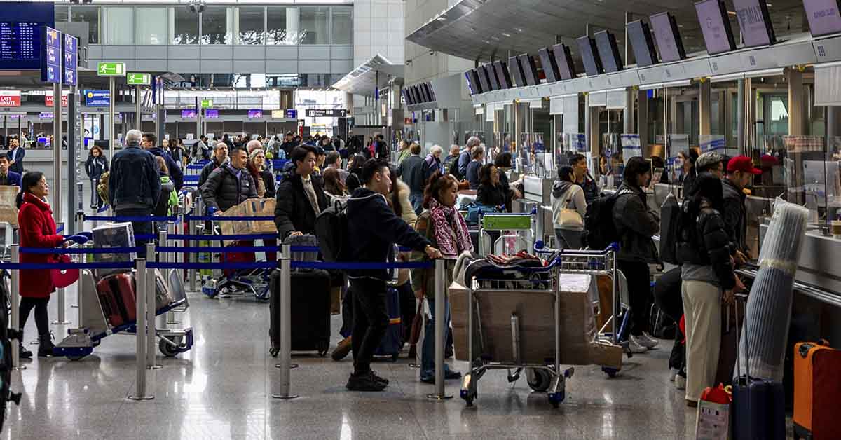 traveler at busy airport