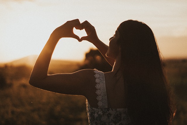 girl making hand sign