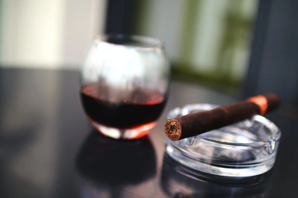 Brown Tobacco Beside Drinking Glass