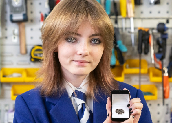 Rebecca with her first prize medal