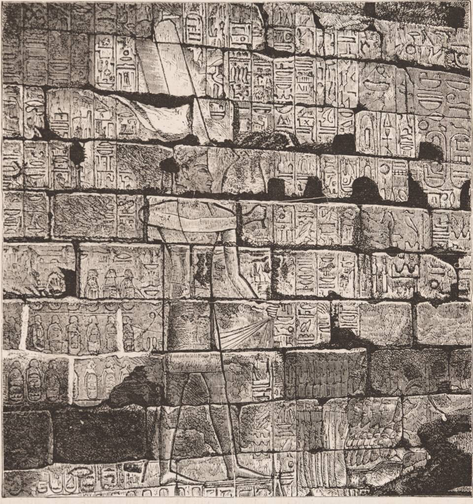 Wall covered in ancient hieroglyphics and inscriptions, similar to Egyptian monuments at Karnak Temple that mention Pharaoh Shishak's campaign against Jerusalem, confirming accounts of Biblical Figures with evidence from Egypt's own historical records