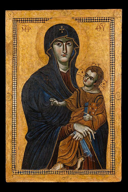 The 'Salus Populi Romani' (Protector of the Roman People), a Byzantine-style icon dating back centuries. The sacred painting shows Mary wearing a dark blue mantle, holding the infant Jesus who is dressed in orange-gold robes. Both figures have golden halos, and the icon features Greek letters and is set against a rich gold background with a decorative border. This treasured icon, which Pope Francis frequently visited, is housed in the Papal Basilica of Saint Mary Major where the Pope will be buried.