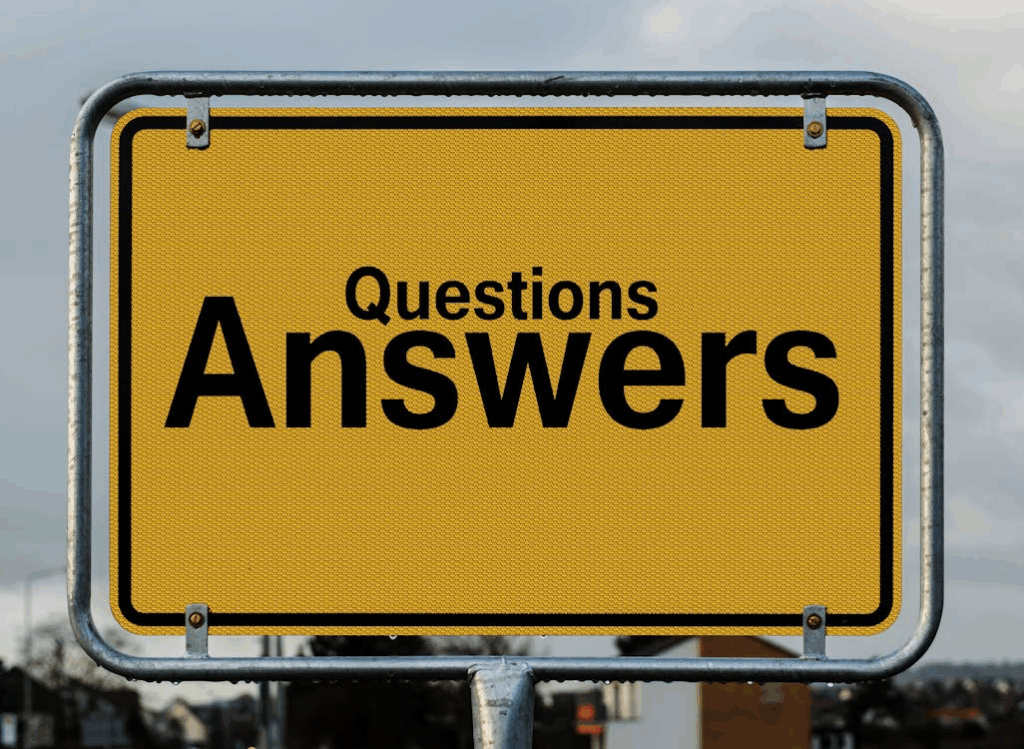 Yellow road sign with the words 'Questions' and 'Answers' representing frequently asked questions about the new identification requirements.