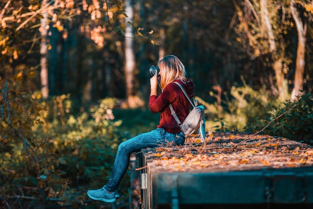 woman taking photos of nature