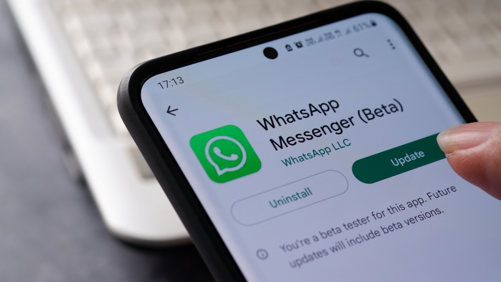 Updating WhatsApp Messenger Beta app from Play store on Android smartphone. Jakarta, 22 august 2022.
