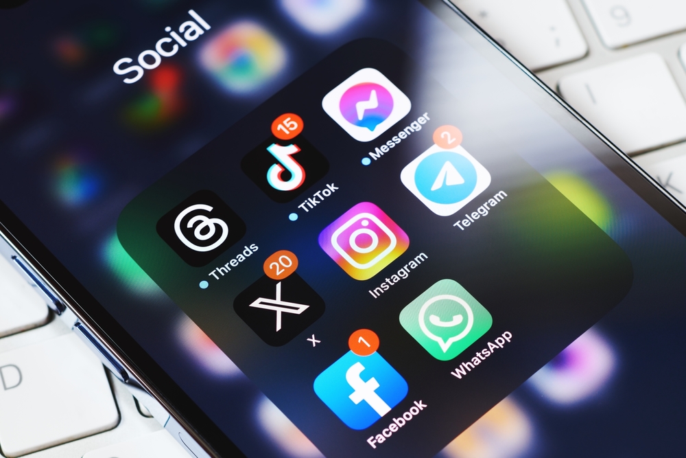 Moscow, Russia, 29-07-2023: New Elon Musk's twitter X app on smartphone screen surrounded by other social media network apps. Twitter rebranding. Modern social media communication.
