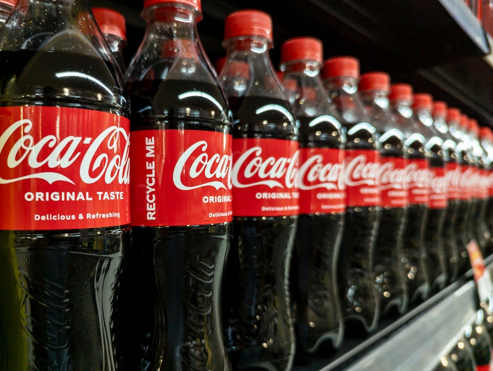 Manila, Philippines - Sept 3, 2023: 500 ml PET bottles of regular coca-cola soda for sale at the supermarket.

