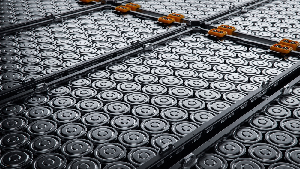Close-up of EV Battery Cells Stacked inside Modules. High Capacity Battery for Automotive Industry. Lithium-ion High-voltage Battery for Electric Vehicle or Hybrid Car.

