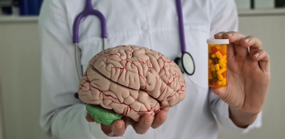 Doctor holds psycho neurological pills for brain in hands. Dementia alzheimer disease