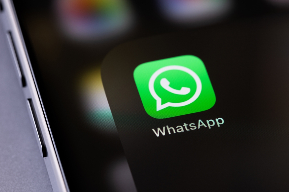 WhatsApp mobile app on a screen smartphone iPhone closeup. WhatsApp is a popular free instant text messaging system for mobile and other platforms. Batumi, Georgia - December 3, 2023