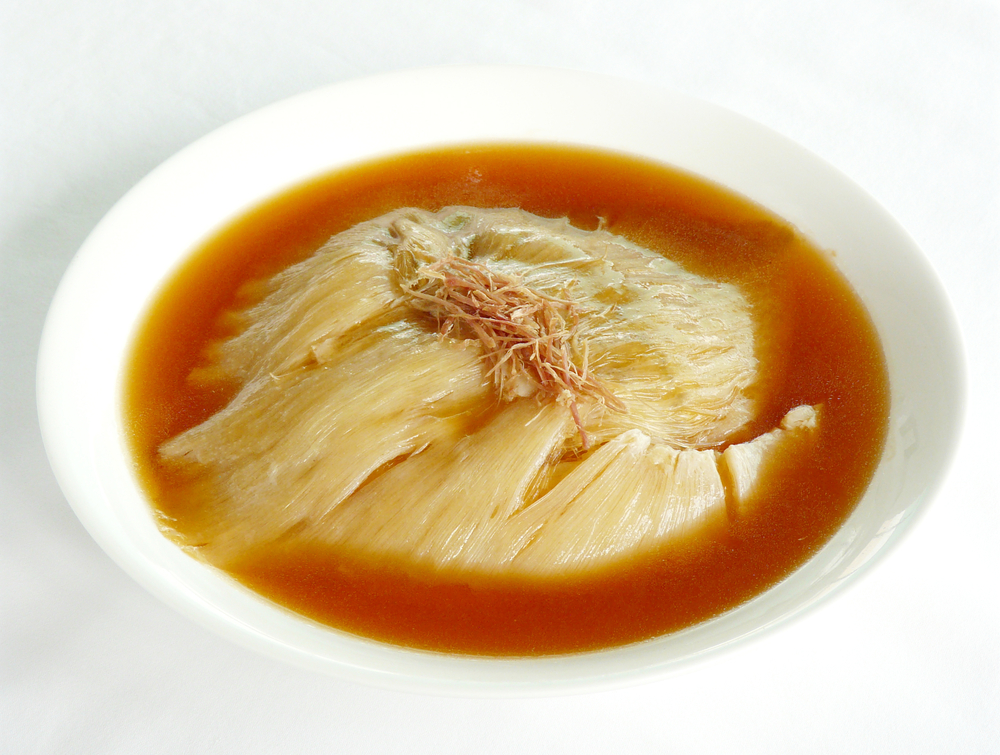 chinese food - shark fin soup in white bowl