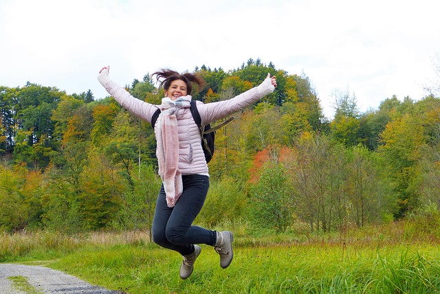 woman jumping happily