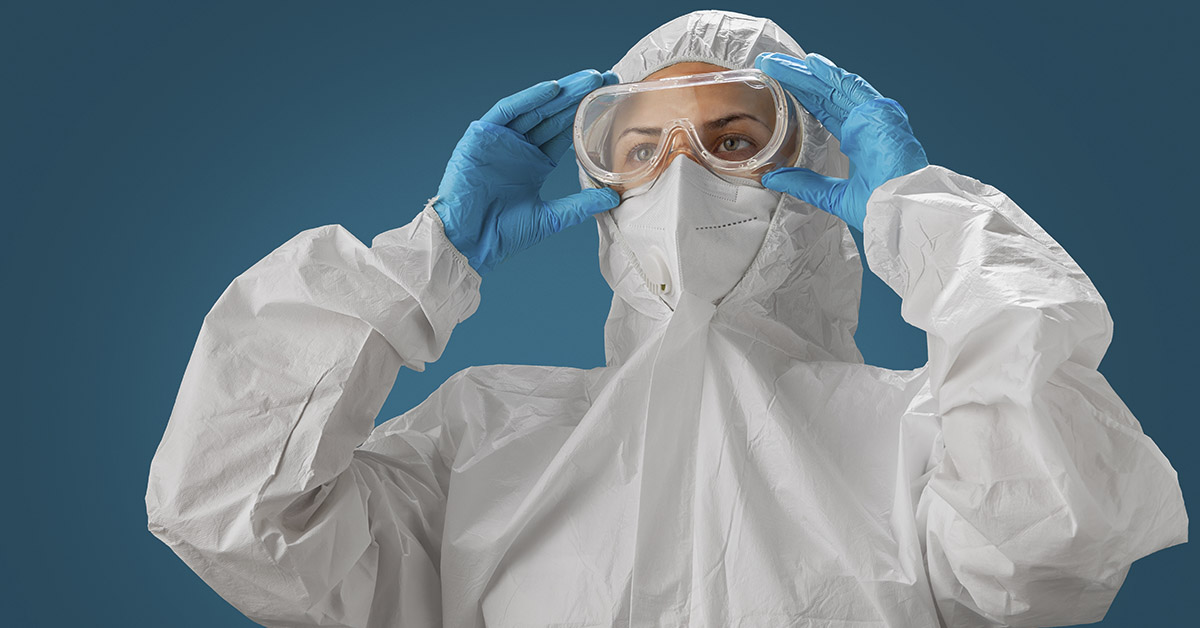 person in hazmat suit