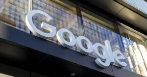 Google’s Profits Jumped by $8 Billion — and They’re Not Explaining Why Google sign above doorway entrance