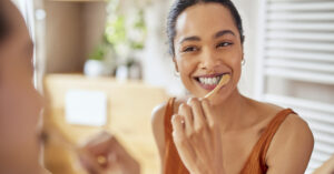 Woman brushing her teeth