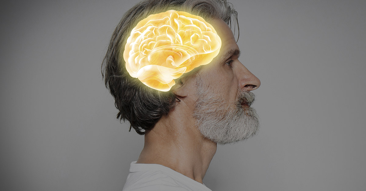Brain highlighted in mans head