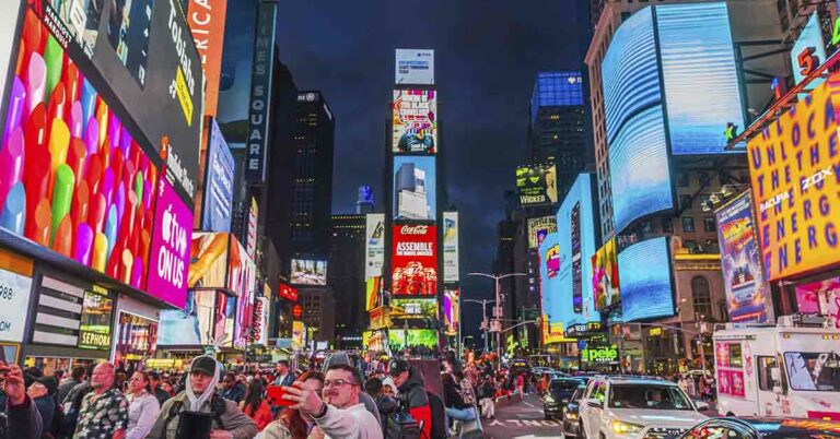 New Bronze Statue of Woman Installed in the Heart of Times Square - Featured image