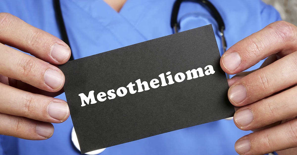 Doctor holding sign saying mesothelioma
