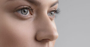 close up of woman's face including eyes and nose