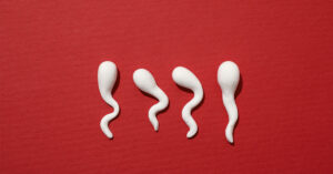Is There Birth Control for Men? Exploring All Current and Upcoming Methods 4 sperm with red background. Male reproduction and male contraceptive concept