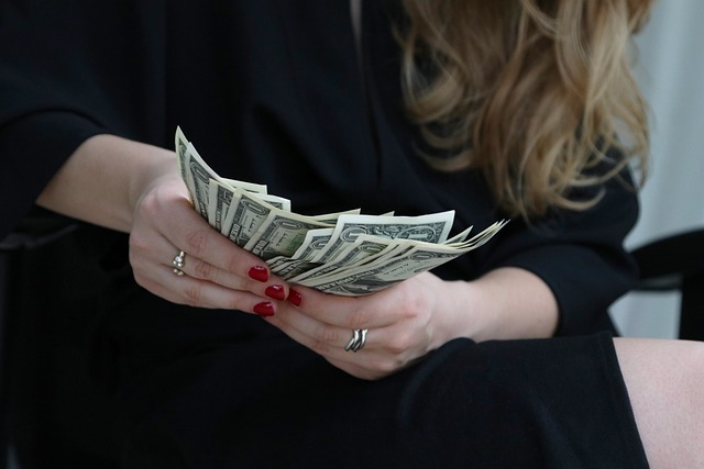 woman holding money
