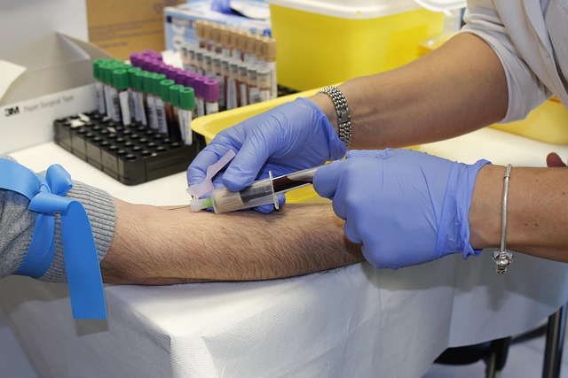 doctor taking blood sample