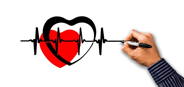 man drawing heart pulse