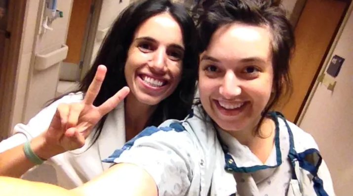 Emma nad her sister during hospital stay