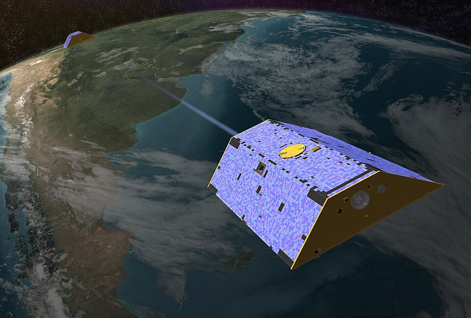 An artist’s rendering of the Gravity Recovery and Climate Experiment (GRACE) satellite orbiting Earth, highlighting advanced technology used to measure subtle shifts in gravitational fields caused by ice sheet dynamics and climate-driven changes.