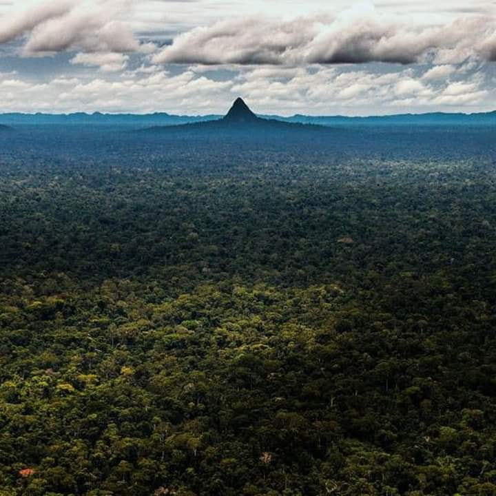 El Cono mountain in the distance of the Peruvian Amazon Rainforest