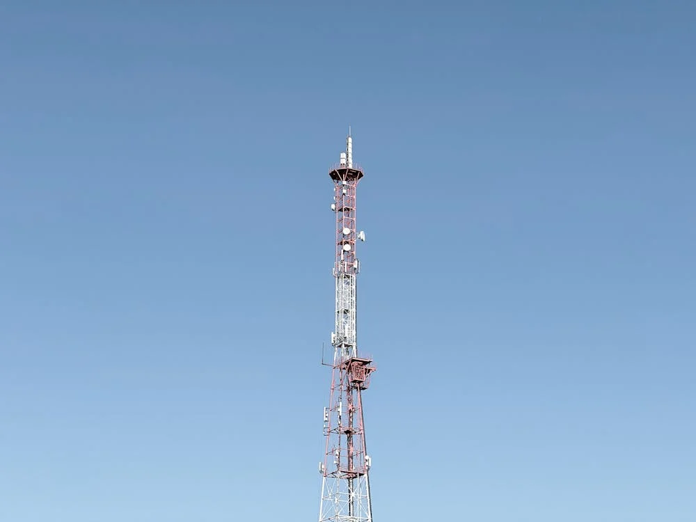Communication Tower Against Clear Blue Sky