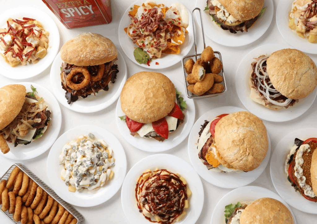 Variety of Gourmet Burgers and Sides on Display