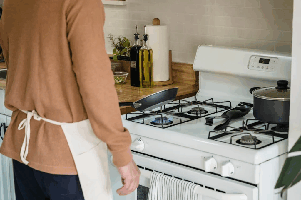 A Person Holding a Frying Pan