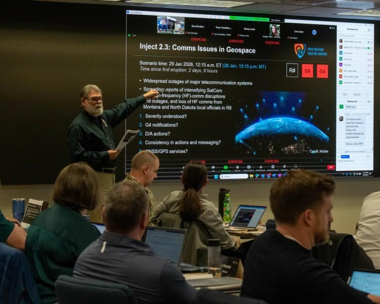 Emergency preparedness briefing about space weather impacts on communication and power grid systems.