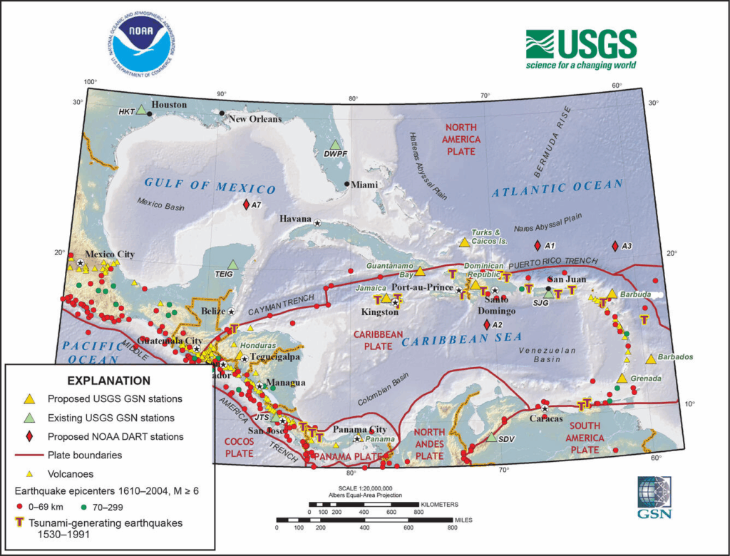 Earthquake monitoring map showing NOAA and USGS stations across the Caribbean with red dots marking epicenters where magnitude 6 quakes have killed over 1600 people.