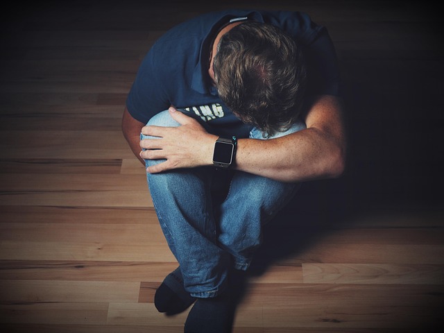 man in pain on floor