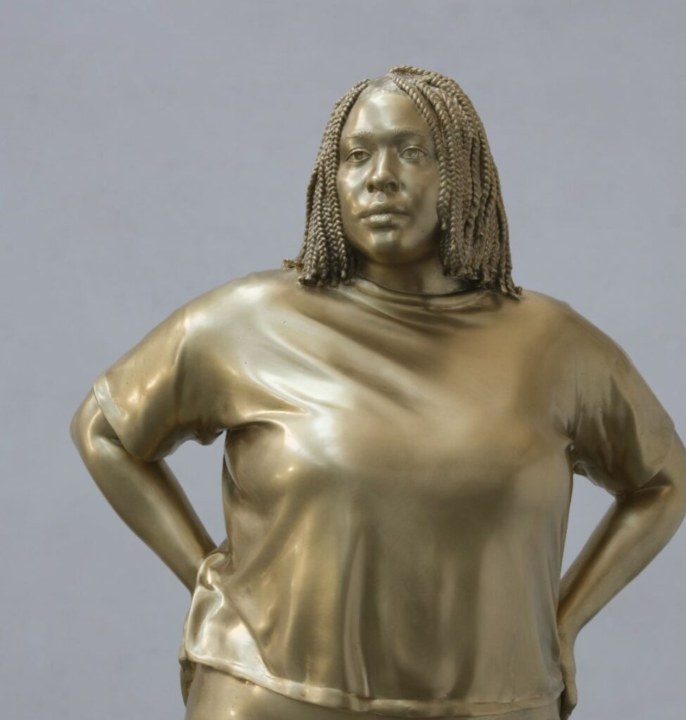 Moments Contained bronze statue