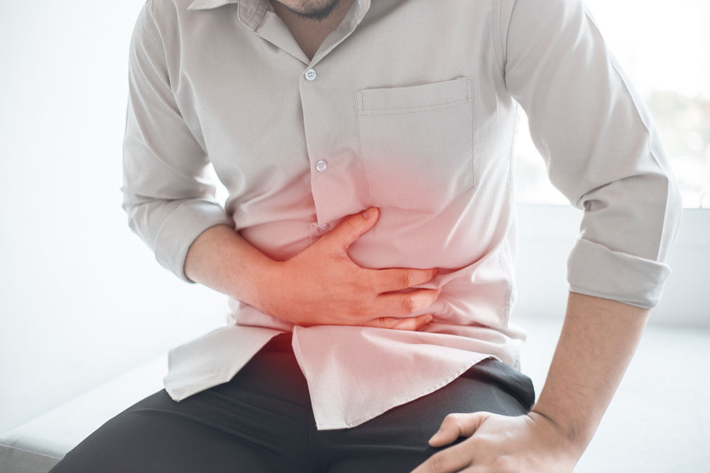 Man with abdominal pain. Abodominal disease concept.