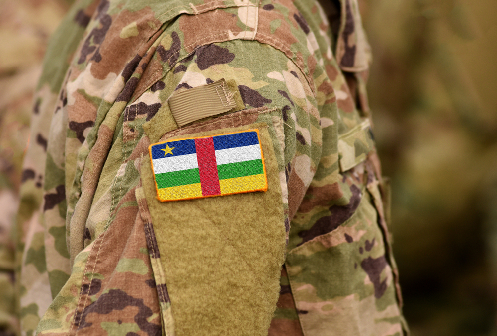 Central African Republic flag on soldiers arm. Central African Republic troops (collage)