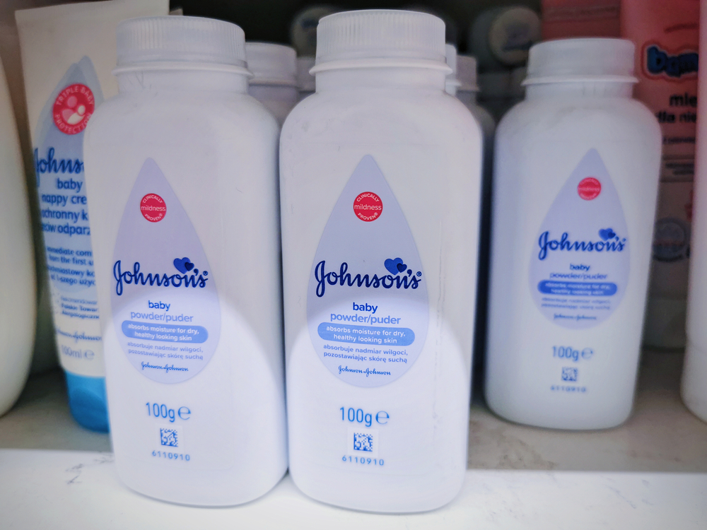 WARSAW, POLAND - 21MAY2020: Talcum baby powder bottles on market shelf in Europe. Illustrative editorial photography.